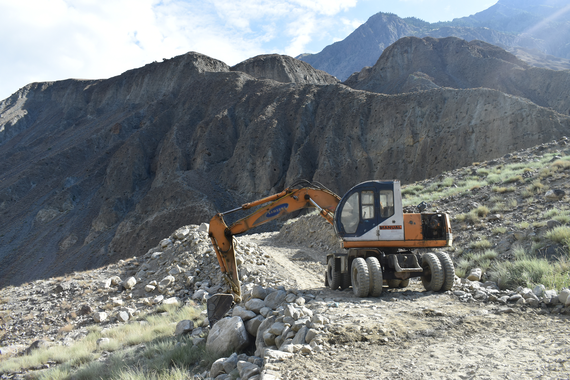 Excavator at work on FMR construction, Gulapur, Punyal, Ghizer